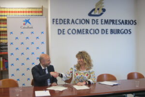 La Federación de Empresarios de Comercio de Burgos y Caixabank firman convenio de colaboración